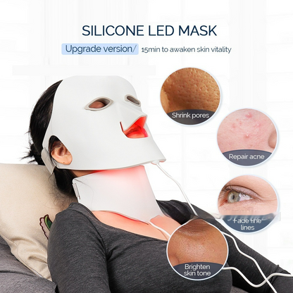 Woman relaxing while wearing the white silicone LuminaGlow™ LED mask glowing red