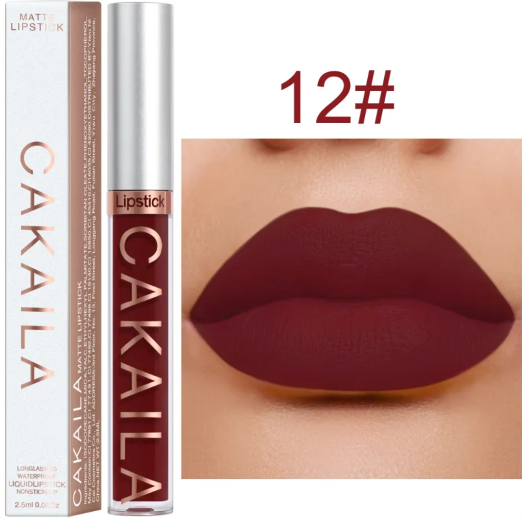 Shade 12 of the VelvetGlow™ lip color shown as a tube, box, and dark burgundy lip swatch