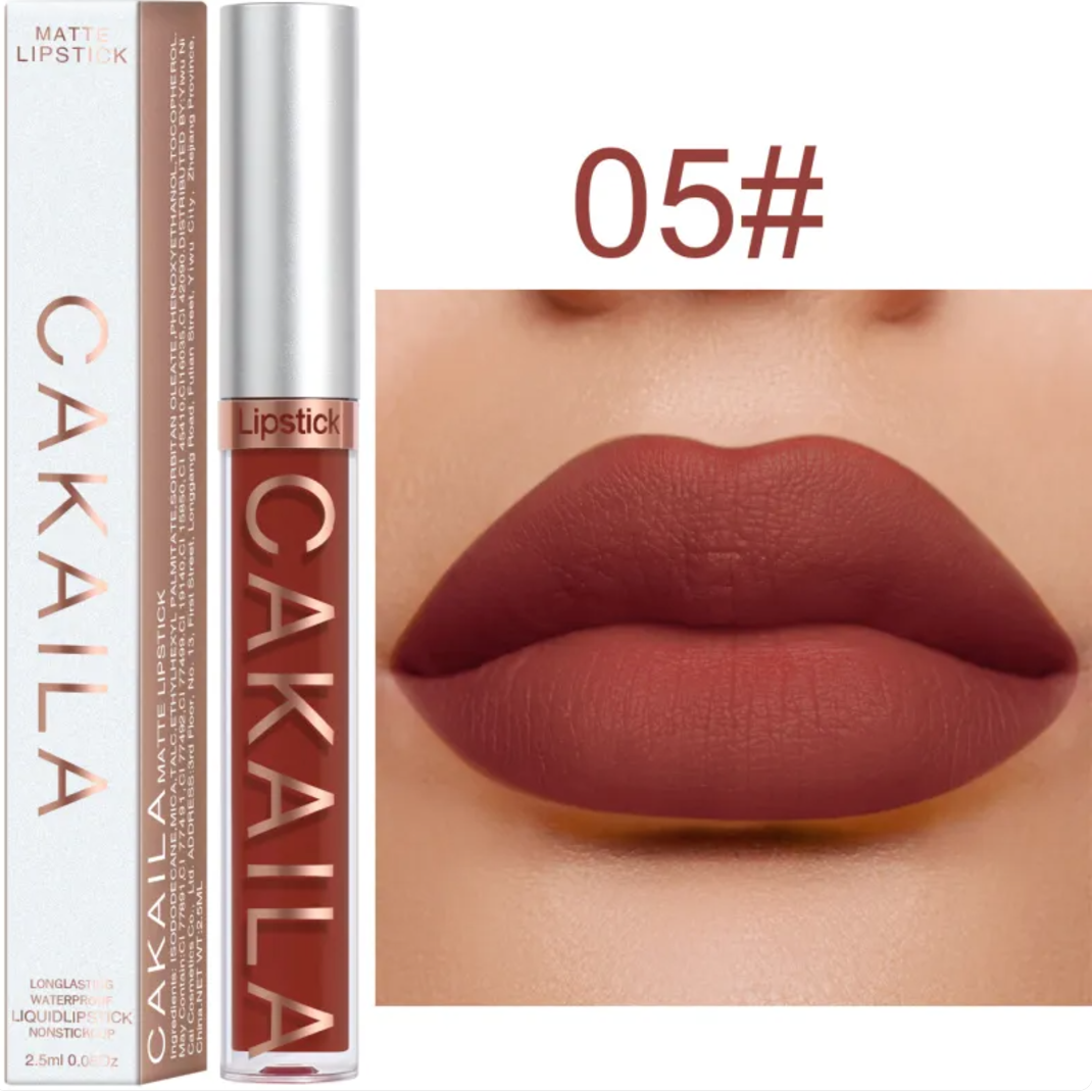 Shade 05 of the VelvetGlow™ lip color shown as a tube, box, and reddish-brown lip swatch