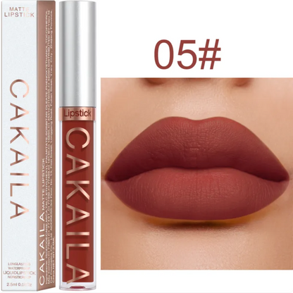 Shade 05 of the VelvetGlow™ lip color shown as a tube, box, and reddish-brown lip swatch