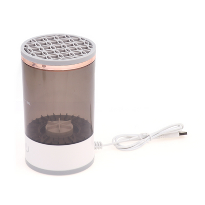 Makeup brush set beside the SwiftClean™ electric brush cleaner and instruction sheet